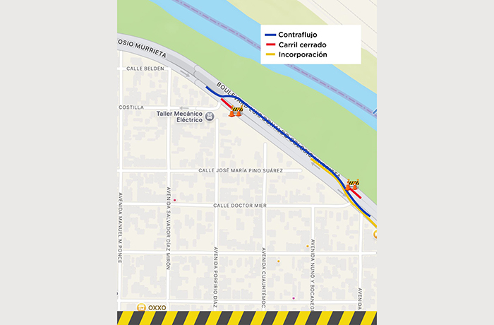 Map showing street grid with a diagonal highway carrying a contraflow (blue line) and a closed lane (red line) beside a river; yellow ramp incorporation symbols and barriers at ends; legend in top-right.