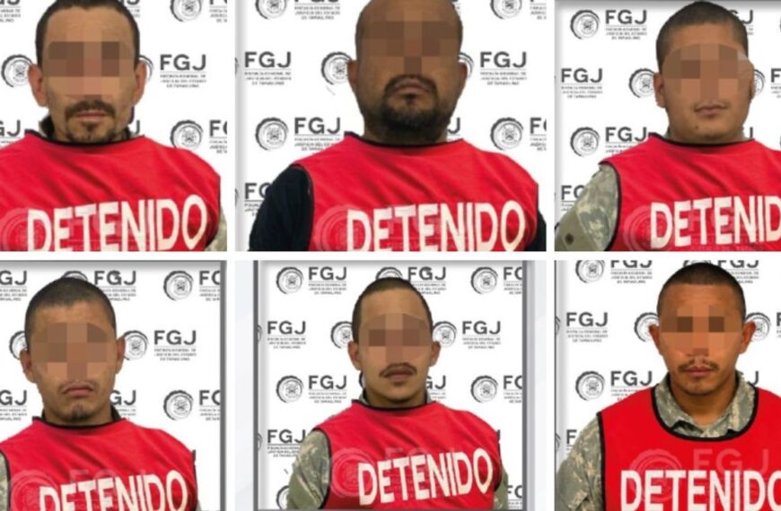 Six men in red 'DETENIDO' vests stand against a backdrop with FGJ logos, faces pixelated for privacy.